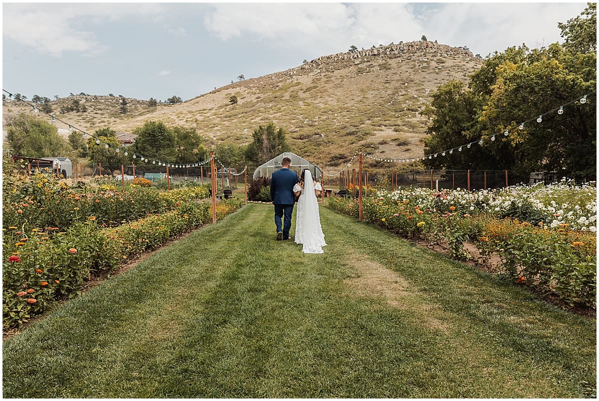 Couple portraits at the flower field at Lyons Farmette